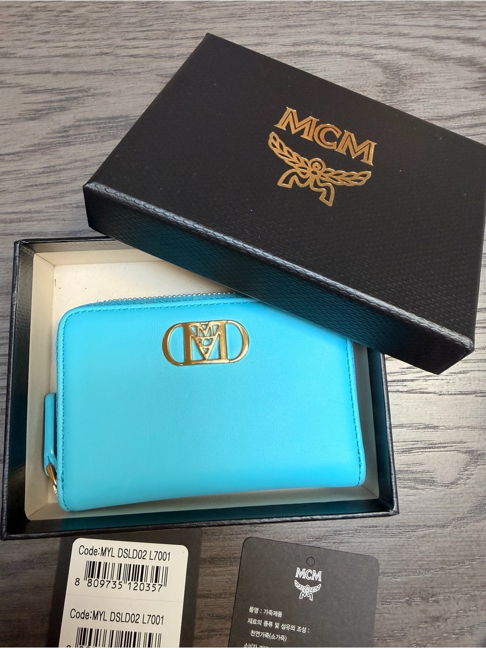 MCM Turquoise Zip Card Holder with Gold Emblem